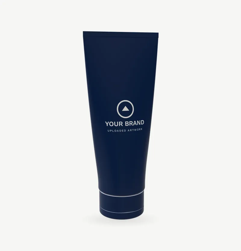 A navy body lotion tube with brand artwork in light ink